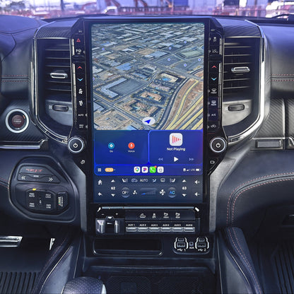 Car dashboard with a large touchscreen display showing a map.