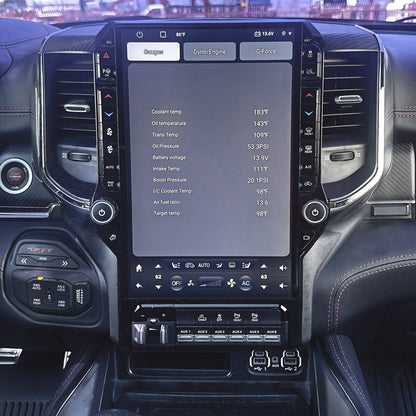 Car interior with a large touchscreen display and dashboard controls.