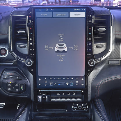 Car interior with a large touchscreen display in the center console.